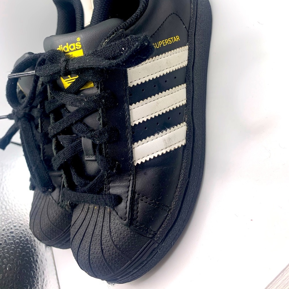 Black And white Adidas Superstar